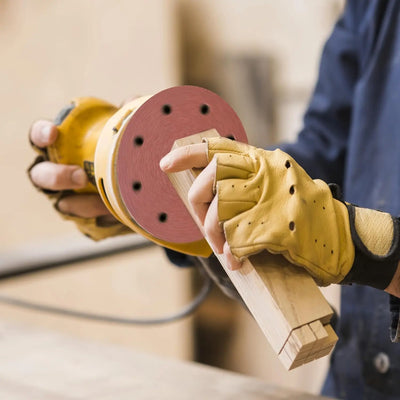 An image of a   150-piece Sanding Discs Set - 5-Inch 8-Hole Sandpaper 10 Grades Include 60, 80, 100, 120, 150,180, 240, Grits for Random Orbital Sander by LONGTERM house floor