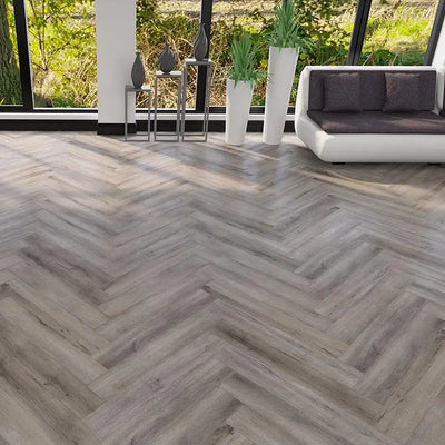 An image of a   Athens Collection Herringbone SPC Flooring Frosted by LONGTERM house floor