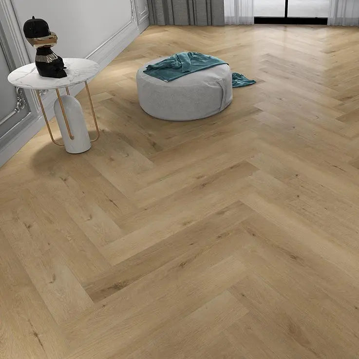 An image of a   Athens Collection SPC Flooring Herringbone Honey Beige by LONGTERM house floor