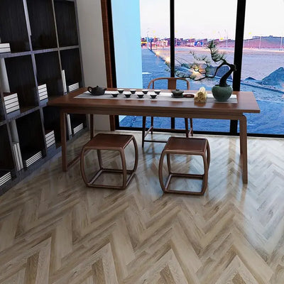 An image of a   Athens Collection SPC Flooring Herringbone Sand Castle by LONGTERM house floor