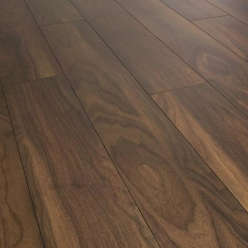 An image of a   [Sample]Swiss Krono Laminate Walnut Rublo by LONGTERM house floor